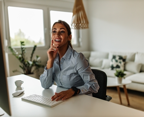 dressed-elegant-sitting-on-the-computer-chair-2024-10-17-09-29-47-utc-495x400