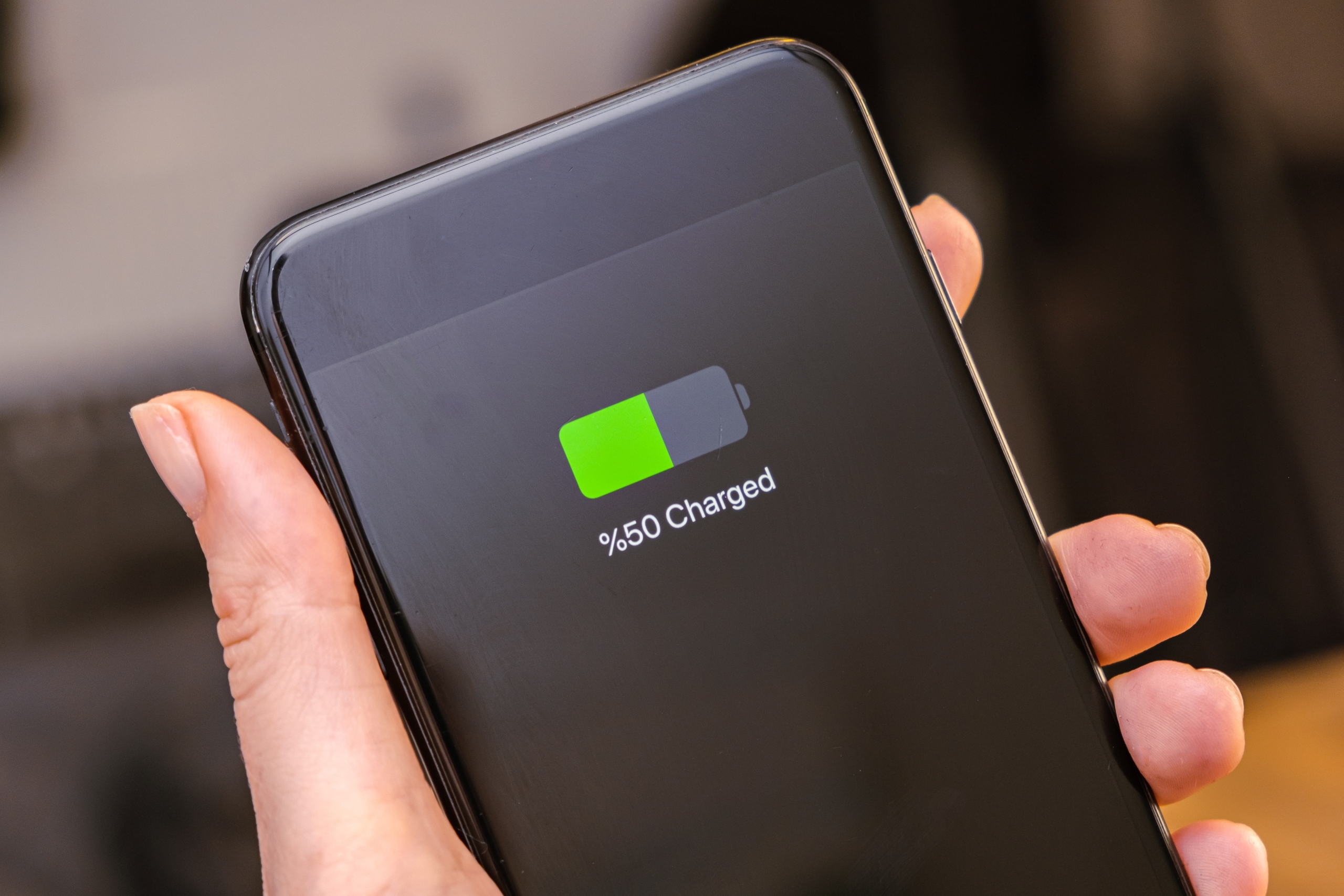 smartphone-screen-battery-charging-showing-half-ch-2023-11-27-05-33-24-utc-scaled