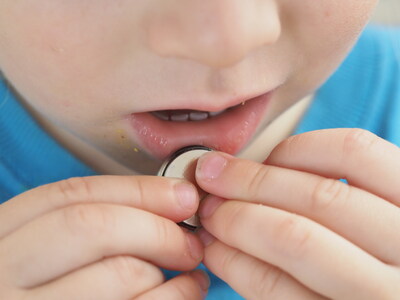 Child eating battery hazard